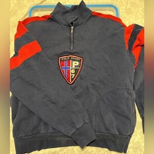 Polo sweater with shield